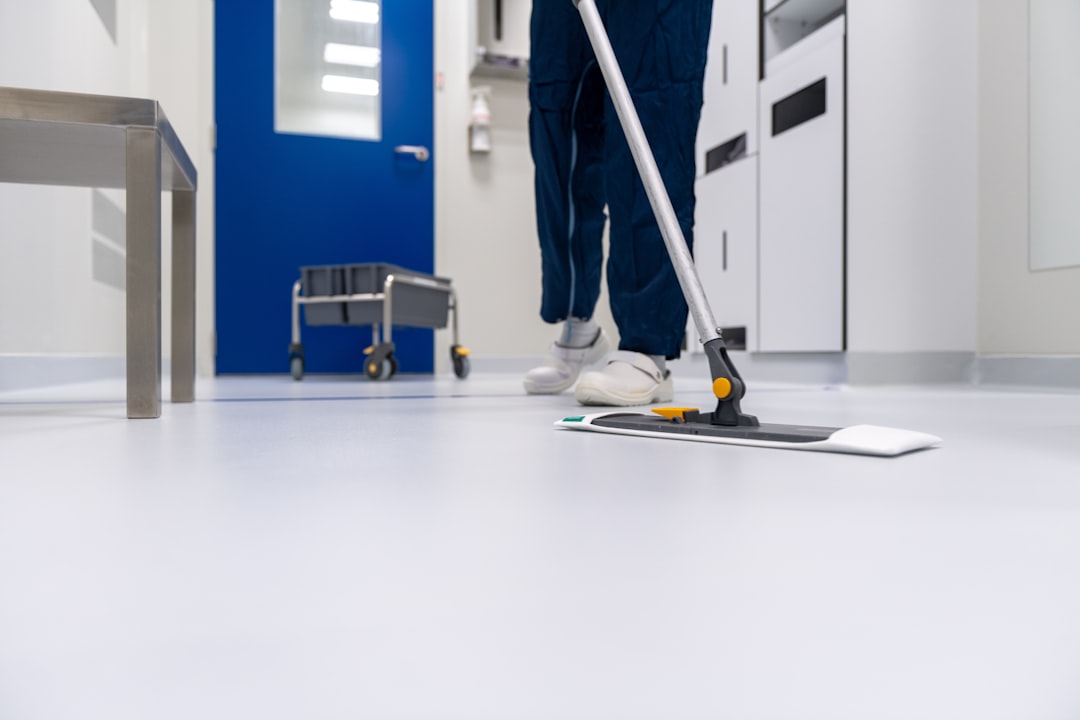 about-02 Cleaner cleaning the floor in a laboratory environment
